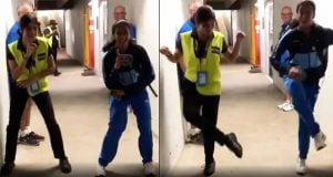 Jemimah Rodrigues shows off her dance moves with an Australian security guard