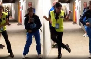 Jemimah Rodrigues shows off her dance moves with an Australian security guard