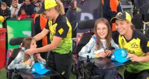 Sophie Molineux gives her gold medal to the differently-abled fan