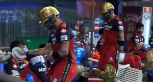Virat Kohli knocks down a chair in frustration after getting out